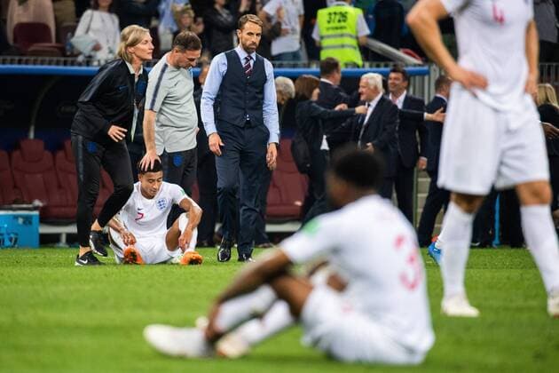 180711 Jesse Lingard and head coach Gareth Southgate of England look dejected after losing the FIFA World Cup semi final match between Croatia and England on July 11 2018 in Moscow Photo Petter Arvidson BILDBYRAN Code PA 92085  Copyright: PETTERxARVIDSON BB180711PA184