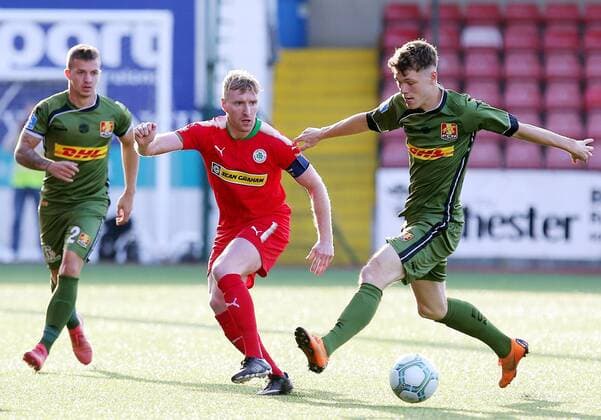 UEFA Europa League First Qualifying Round First Leg, Solitude, Belfast 12 7 2018 Cliftonville vs Nordsjaelland Cliftonville s Chris Curran with Nordsjaelland s Karlo Bartlec (left) and Andreas Olsen Chris Curran with Karlo Bartlec (left) and Andreas Olsen 12 7 2018  Copyright: x©INPHO JonathanxPorterx 120718JP2football001