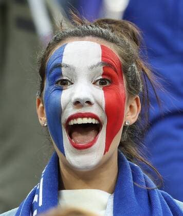 ST PETERSBURG, RUSSIA - JULY 10, 2018: France s fan roots for his team in the 2018 FIFA World Cup WM Weltmeisterschaft Fussball Semi-final match between France and Belgium at Saint Petersburg Stadium. 