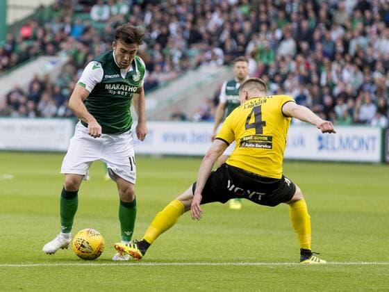 12th July 2018, Easter Road, Edinburgh, Scotland; UEFA Europa League football, first qualifying round, 1st leg, Hibernian versus NSI Runavik; Stevie Mallan of Hibernian takes on Jens Joensen of NSI Runavik  ActionPlus12047052 AlanxRennie