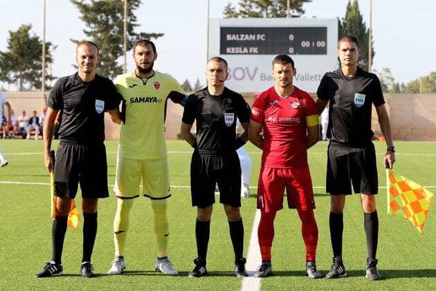 12 07 2018 - Centenary Stadium, Ta Qali, Malta UEFA Europa League 2018 2019 First Qualifying Round, First Leg Match Referee Volen Chinkov (BUL) (C) together with his match officials and team captains ahead of the UEFA Europa League, First Qualifying Round, first leg match between Balzan FC of Malta and Kesla FK from Azerbaijan at the Centenary Stadium, Ta Qali, Malta on 12 July, 2018. Balzan FC won the first leg 4-1. Balzan FC v Kesla FK - UEFA Europa League 2018 19 UEL_18_19