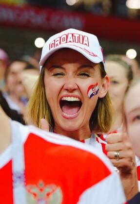 A Croatian football fan celebrates after Croatia defeated England in their semifinal match during the 2018 FIFA World Cup WM Weltmeisterschaft Fussball in Moscow, Russia, 11 July 2018. Croatia ends England in extra time to meet France in World Cup final  pbu833040_02