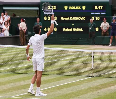 Novak Djokovic rejoices after his victory cheers joy emotion scoreboard scoreboard result Copyright: xJuergenxHasenkopfx