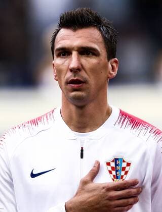 MOSCOW, RUSSIA - JULY 15, 2018: Croatia s Mario Mandzukic listening to the Croatian national anthem ahead of the 2018 FIFA World Cup WM Weltmeisterschaft Fussball Final match between France and Croatia at Luzhniki Stadium. Valery Sharifulin TASS  TS089860