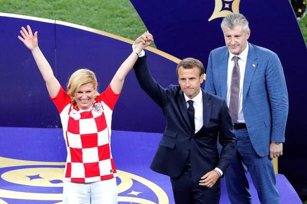 , French President Emmanuel Macron (R) next to Croatian President Kolinda Grabar-Kitarovic celebrate after the FIFA World Cup WM Weltmeisterschaft Fussball 2018 final soccer match between France and Croatia, at Luzhniki Stadium in Moscu, Russia, 15 July 2018. FRANCE VS. CROATIA !ACHTUNG: NUR REDAKTIONELLE NUTZUNG!  Copyright: xLavandeiraxjrx FWC64-556 20180715-636672832621665928