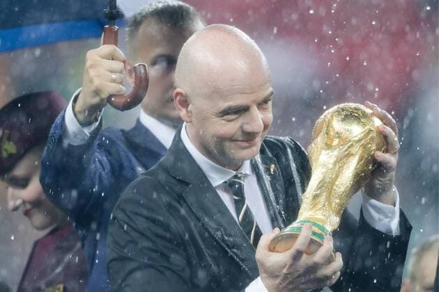 MOSCOW, RUSSIA â€“ JULY 15, 2018: FIFA President Gianni Infantino holds the trophy at a victory ceremony after the 2018 FIFA World Cup WM Weltmeisterschaft Fussball final football match between France and Croatia at Luzhniki Stadium. Team France won the game 4:2 and claimed the World Cup title. Mikhail Metzel TASS  TS089A50