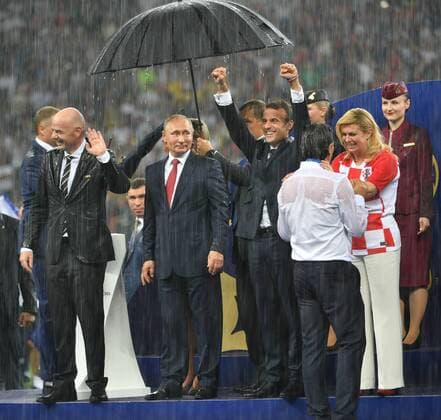 (180715) -- MOSCOW, July 15, 2018 -- FIFA President Gianni Infantino (1st L, front), Russian President Vladimir Putin (2nd L, front), French President Emmanuel Macron (3rd L, front) and Croatian President Kolinda Grabar-Kitarovic attend the awarding ceremony after the 2018 FIFA World Cup WM Weltmeisterschaft Fussball final match between France and Croatia in Moscow, Russia, July 15, 2018. France defeated Croatia 4-2 and claimed the title. ) (SP)RUSSIA-MOSCOW-2018 WORLD CUP-FINAL-FRANCE VS CROATIA LiuxDawei