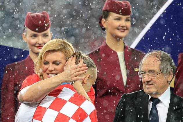 FuÃŸball, WM Finale 2018 in Moskau, Frankreich - Kroatien MOSCOW, RUSSIA â€“ JULY 15, 2018: Croatia s President Kolinda Grabar-Kitarovic, Croatia s defender Domagoj Vida, and French Football Federation (FFF) President Noel Le Graet (L-R) at a victory ceremony after the 2018 FIFA World Cup WM Weltmeisterschaft Fussball final football match between France and Croatia at Luzhniki Stadium. Team France won the game 4:2 and claimed the World Cup title. Sergei Bobylev TASS  TS089BB3