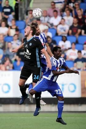 Anthony Annan 22, HJK Helsinki, FIN, Gunnar Vatnhamar 24, Víkingur, FRO and Hannu Patronen 4, HJK Helsinki, FIN during their UEFA Champions League 1QR match HJK Helsinki - Víkingur in Telia 5G Arena 17. July 2018 in Helsinki, Finland.  Copyright: xMattixMatikainenx NP24_00303383