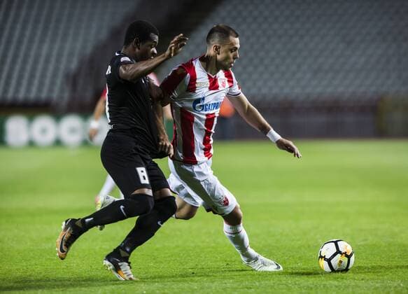17th July 2018, Rajko Mitic Stadium, Belgrade, Serbia; UEFA Champions League Qualification, first qualifying round, 2nd leg, Red Star Belgrade versus Spartaks Jurmala; Midfielder Vitor Silva Honorato of Spartak Jurmala in action against Defender Milan Rodic of Red Star Belgrade  ActionPlus12048445 NikolaxKrstic