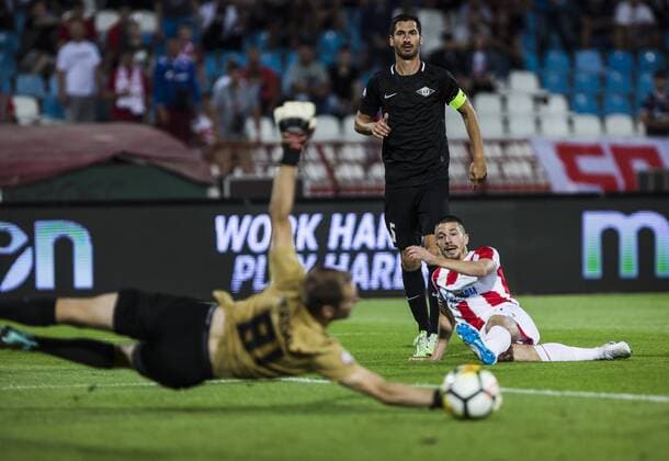17th July 2018, Rajko Mitic Stadium, Belgrade, Serbia; UEFA Champions League Qualification, first qualifying round, 2nd leg, Red Star Belgrade versus Spartaks Jurmala; Midfielder Milan Jevtovic of Red Star Belgrade shoots on the goal but sees his effort well saved  ActionPlus12048474 NikolaxKrstic