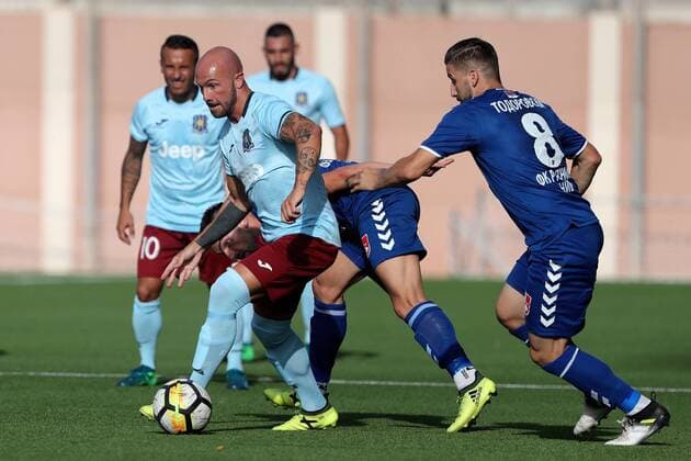 19 07 2018 - Centenary Stadium, Ta Qali, Malta UEFA Europa League 2018 2019 First Qualifying Round, 2nd Leg Thomas Veronese (L) of Gzira United and Aleksandar Todorovski (R) of FC FK RadniÄki NiÅ¡ during the UEFA Europa League, First Round, second leg match between Gzira United FC of Malta and FK RadniÄki NiÅ¡ of Serbia, at the Centenary Stadium, Ta Qali, Malta on 19 July 2018. UEFA Europa League - Gzira United FC v FK RadniÄki NiÅ¡ UEL_18_19