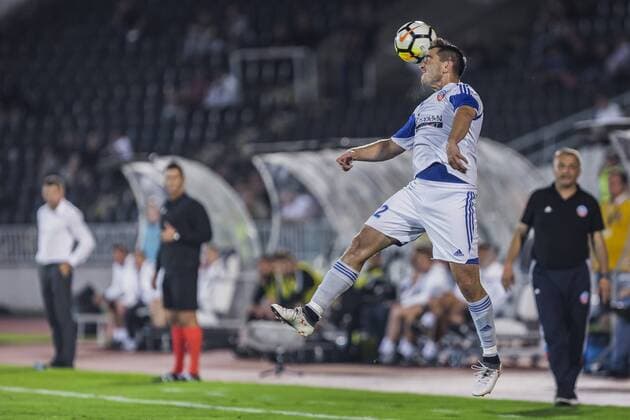 19th July 2018, Partizan Stadium, Belgrade, Serbia; UEFA Europa League football, first qualifying round, 2nd leg, Partizan versus Rudar Pljevlja; Defender Zeljko Tomasevic of Rudar Pljevlja manages a crossed high ball on his head  ActionPlus12048812 NikolaxKrstic