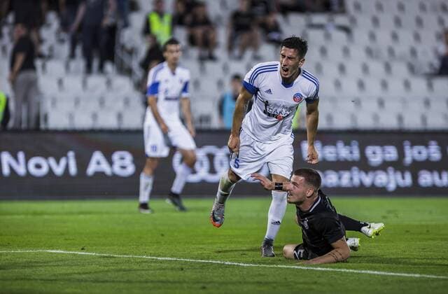 19th July 2018, Partizan Stadium, Belgrade, Serbia; UEFA Europa League football, first qualifying round, 2nd leg, Partizan versus Rudar Pljevlja; Defender Nemanja Sekulic of Rudar Pljevlja reacts after the tackle  ActionPlus12048813 NikolaxKrstic
