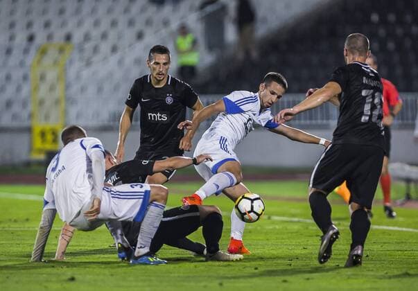 19th July 2018, Partizan Stadium, Belgrade, Serbia; UEFA Europa League football, first qualifying round, 2nd leg, Partizan versus Rudar Pljevlja; Marko Vukovic of Rudar Pljevlja fights for the ball against players of Partizan  ActionPlus12048881 NikolaxKrstic