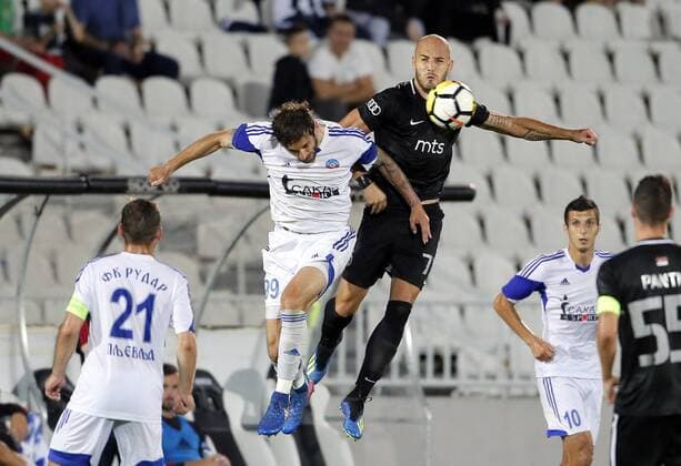 (180720) -- BELGRADE, July 20, 2018 -- Partizan s Nemanja Miletic (Top, R) vies with Rudar s Armin Bosnjak (Top, L) during the first qualifying round UEFA Europa League football match between Partizan and Rudar in Belgrade, Serbia on July 19, 2018. Partizan won 3-0. ) (SP)SERBIA-BELGRADE-UEFA-FOOTBALL-PARTIZAN VS RUDAR PredragxMilosavljevic 