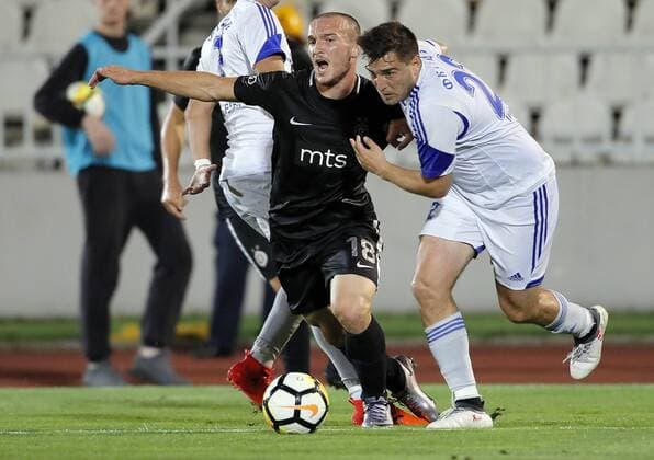 (180720) -- BELGRADE, July 20, 2018 -- Partizan s Djordje Ivanovic (L) vies with Rudar s Zeljko Tomasevic during the first qualifying round UEFA Europa League football match between Partizan and Rudar in Belgrade, Serbia on July 19, 2018. Partizan won 3-0. ) (SP)SERBIA-BELGRADE-UEFA-FOOTBALL-PARTIZAN VS RUDAR PredragxMilosavljevic 