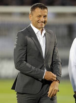 (180720) -- BELGRADE, July 20, 2018 -- Partizan s coach Miroslav Djukic smiles during the first qualifying round UEFA Europa League football match between Partizan and Rudar in Belgrade, Serbia on July 19, 2018. Partizan won 3-0. ) (SP)SERBIA-BELGRADE-UEFA-FOOTBALL-PARTIZAN VS RUDAR PredragxMilosavljevic 