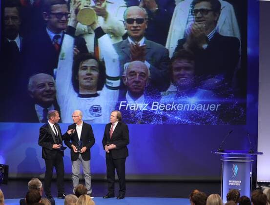 Bavarian Sports Prize of the Prime Minister Franz Beckenbauer is awarded the title of Sportsman of Bavaria Franz Beckenbauer is awarded Sportsman of the Century Presenter Markus Othmer Franz Beckenbauer and Günter Netzer Münchdn Bavaria Germany BMW Welt