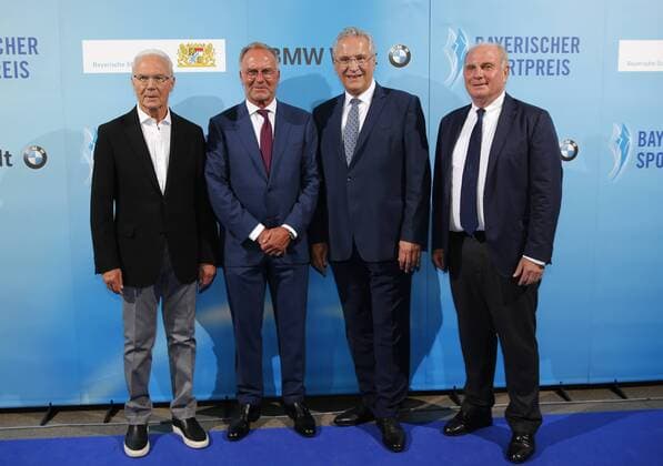 Franz Beckenbauer is awarded Sportsman of the Year by Franz Beckenbauer Franz Beckenbauer Karl Heinz Rummenigge Minister of the Interior Joachim Herrmann and Uli Hoeneß Münchdn Bavaria Germany BMW Welt