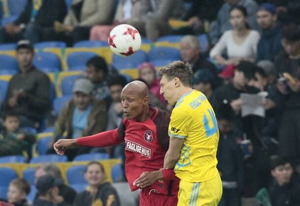 FCMs Ayo Okosun and Postnikov vie for the ball during the UEFA Champions League second qualifying round first leg football match between FC Astana and FC Midtjylland in Astana on July 24, 2018. , Denmark  Copyright: ALEXEIxFILIPPOVx cop108 spdk20180724-172242-L