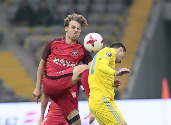 FCMs Kian Hansen and Shomko vie for the ball during the UEFA Champions League second qualifying round first leg football match between FC Astana and FC Midtjylland in Astana on July 24, 2018. , Denmark  Copyright: ALEXEIxFILIPPOVx cop108 spdk20180724-172321-L