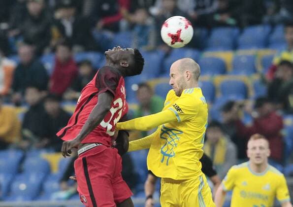 FCMs Paul Onuachu and Maevski vie for the ball during the UEFA Champions League second qualifying round first leg football match between FC Astana and FC Midtjylland in Astana on July 24, 2018. , Denmark  Copyright: ALEXEIxFILIPPOVx cop108 spdk20180724-172354-L