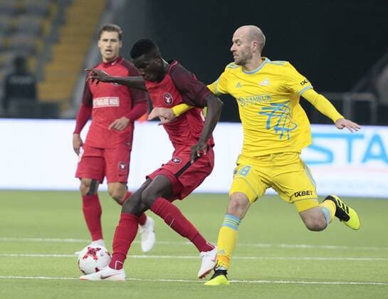 FCMs Paul Onuachu and Maevski vie for the ball during the UEFA Champions League second qualifying round first leg football match between FC Astana and FC Midtjylland in Astana on July 24, 2018. , Denmark  Copyright: ALEXEIxFILIPPOVx cop108 spdk20180724-172600-L