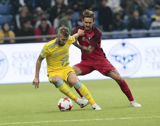 FCMs Kian Hansen and Henrique vie for the ball during the UEFA Champions League second qualifying round first leg football match between FC Astana and FC Midtjylland in Astana on July 24, 2018. , Denmark  Copyright: ALEXEIxFILIPPOVx cop108 spdk20180724-172640-L
