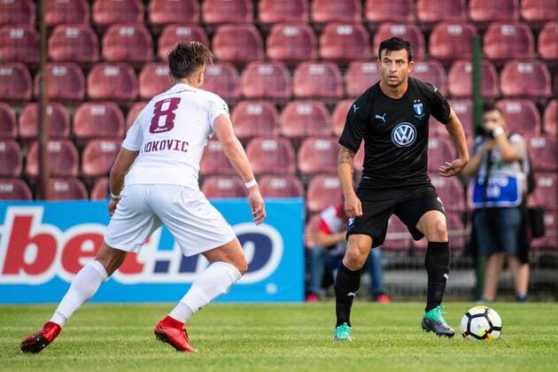 180724 Damjan Djokovic of Cluj and Behrang Safari of Malmö FF in action during the UEFA Champions League qualifying match between Cluj and Malmö FF on July 24, 2018 in Cluj Photo Ludvig Thunman BILDBYRAN code LT 35510  Copyright: LUDVIGxTHUNMAN BB180724LT025