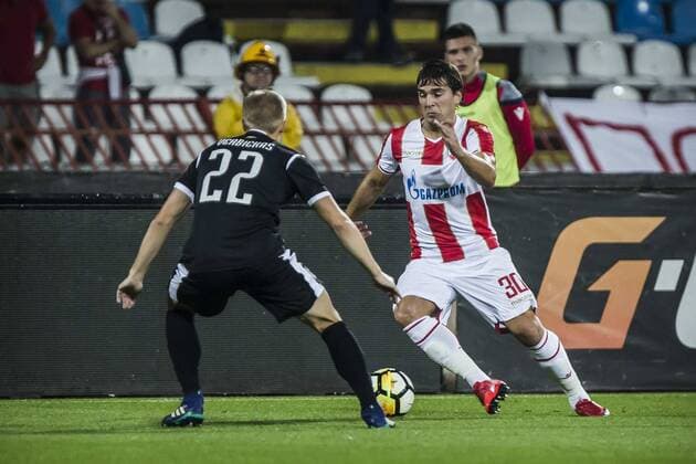 24th July 2018, Rajko Mitic Stadium, Belgrade, Serbia; UEFA Champions League, second qualifying round, 1st leg, Red Star Belgrade versus FK Suduva; Filip Stojkovic of Red Star Belgrade takes on Ovidijus Verbickas of Suduva  ActionPlus12050281 NikolaxKrstic