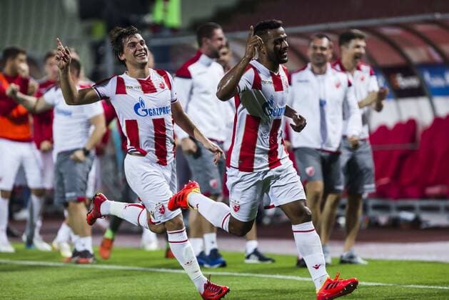 24th July 2018, Rajko Mitic Stadium, Belgrade, Serbia; UEFA Champions League, second qualifying round, 1st leg, Red Star Belgrade versus FK Suduva; Lorenzo Ebecilio of Red Star Belgrade celebrates scoring his goal with team mate Filip Stojkovic  ActionPlus12050290 NikolaxKrstic