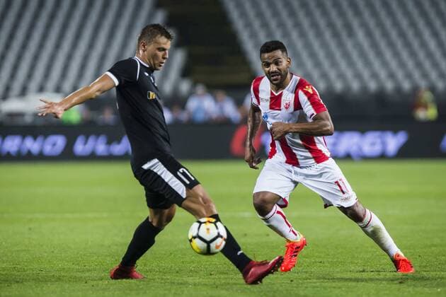 24th July 2018, Rajko Mitic Stadium, Belgrade, Serbia; UEFA Champions League, second qualifying round, 1st leg, Red Star Belgrade versus FK Suduva; Lorenzo Ebecilio of Red Star Belgrade takes on Giedrius Matulevicius of Suduva  ActionPlus12050300 NikolaxKrstic