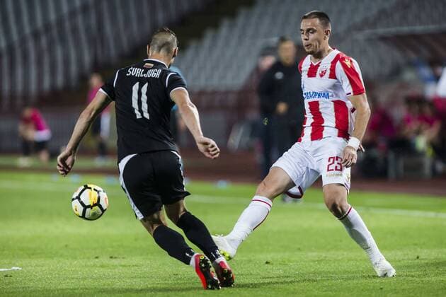 24th July 2018, Rajko Mitic Stadium, Belgrade, Serbia; UEFA Champions League, second qualifying round, 1st leg, Red Star Belgrade versus FK Suduva; Milan Rodic of Red Star Belgrade takes on Andro Svrljuga of Suduva  ActionPlus12050304 NikolaxKrstic