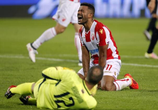 (180725) -- BELGRADE, July 25, 2018 -- Crvena Zvezda s Lorenzo Ebecilio (R) reacts during the UEFA Champions League second qualifying round football match between Crvena Zvezda and Suduva in Belgrade, Serbia on July 24, 2018. Crvena Zvezda won 3-0. ) (SP)SERBIA-BELGRADE-FOOTBALL-UEFA CHAMPIONS LEAGUE-QUALIFYING-CRVENA ZVEZDA VS SUDUVA PredragxMilosavljevic 