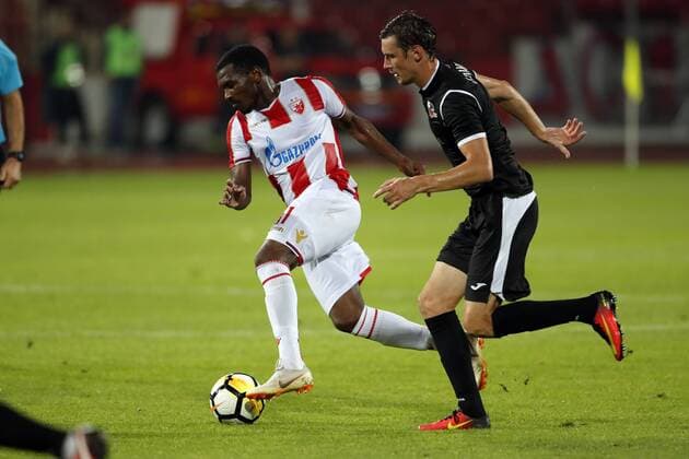 (180725) -- BELGRADE, July 25, 2018 -- Crvena Zvezda s El Fardou Ben Nabouhane (L) vies with Suduva s Povilas Leimonas during the UEFA Champions League second qualifying round football match in Belgrade, Serbia on July 24, 2018. Crvena Zvezda won 3-0. ) (SP)SERBIA-BELGRADE-FOOTBALL-UEFA CHAMPIONS LEAGUE-QUALIFYING-CRVENA ZVEZDA VS SUDUVA PredragxMilosavljevic 