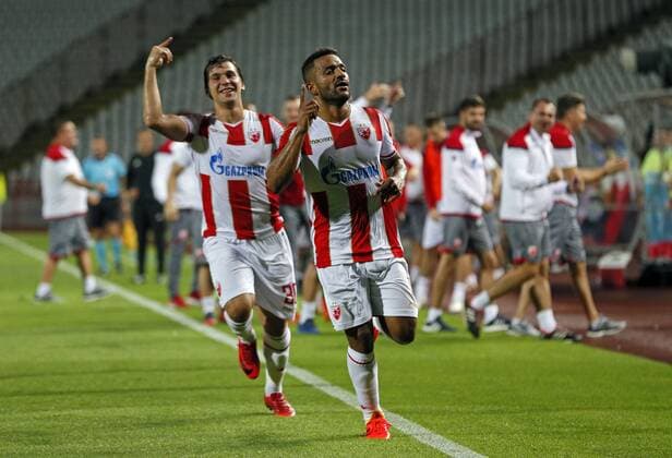 (180725) -- BELGRADE, July 25, 2018 -- Crvena Zvezda s Filip Stojkovic (front L) and Lorenzo Ebecilio (front R) celebrate a goal during the UEFA Champions League second qualifying round football match between Crvena Zvezda and Suduva in Belgrade, Serbia on July 24, 2018. Crvena Zvezda won 3-0. ) (SP)SERBIA-BELGRADE-FOOTBALL-UEFA CHAMPIONS LEAGUE-QUALIFYING-CRVENA ZVEZDA VS SUDUVA PredragxMilosavljevic 
