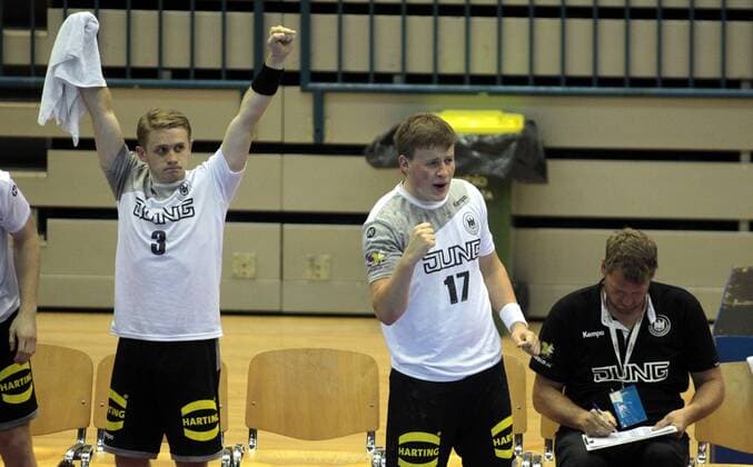 25.07.2018 Celje(Slovenia) Serbia-Germany EHF U20 Under 20 European men s handball championship main round Dimitri Ignatow(L),Mattis Michel(c) Germany celebrate during match : 