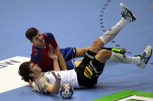 25.07.2018 Celje(Slovenia) Serbia-Germany EHF U20 Under 20 European men s handball championship main round Hendrik Schreiber(front)Germany during match in fight for ball with Uros Todorovic(behind) Serbia : 