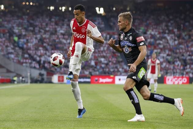 (L-R) Noussair Mazraoui of Ajax, Lukas Grozurek of Sturm Graz during the UEFA Champions League second round qualifying first leg match between Ajax Amsterdam and Sturm Graz at the Johan Cruijff Arena on July 25, 2018 in Amsterdam, The Netherlands UEFA Champions League 2018 2019 xVIxVIxImagesx xMauricexvanxSteenxIVx 11586112