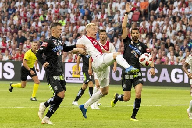 AMSTERDAM, Ajax - Sturm Graz , football, season 2018-2019, Johan Cruijff Arena , 25-07-2018, Johan Cruijff ArenA , UEFA Champions League second qualifying round , 1st leg , Sturm Graz player Dario Maresic and Ajax player Donny van de Beek during the match Ajax - Sturm Graz Ajax - Sturm Graz  x2363574x