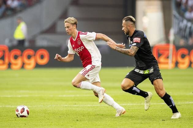 AMSTERDAM, Ajax - Sturm Graz , football, season 2018-2019, Johan Cruijff Arena , 25-07-2018, Johan Cruijff ArenA , UEFA Champions League second qualifying round , 1st leg , Ajax player Frenkie de Jong and Sturm Graz player Peter Zulj during the match Ajax - Sturm Graz Ajax - Sturm Graz  x2363578x