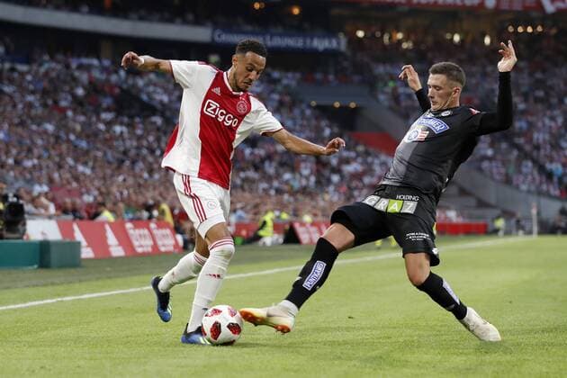 (L-R) Noussair Mazraoui of Ajax, Dario Maresic of Sturm Graz during the UEFA Champions League second round qualifying first leg match between Ajax Amsterdam and Sturm Graz at the Johan Cruijff Arena on July 25, 2018 in Amsterdam, The Netherlands UEFA Champions League 2018 2019 xVIxVIxImagesx xMauricexvanxSteenxIVx 11586418
