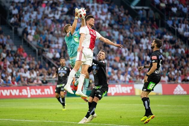 Jorg Siebenhandl of SK Sturm Graz, Klaas Jan Huntelaar of Ajax , Dario Maresic of SK Sturm Graz , Tassos Avlonitis of SK Sturm Graz during the UEFA Champions League second round qualifying first leg match between Ajax Amsterdam and Sturm Graz at the Johan Cruijff Arena on July 25, 2018 in Amsterdam, The Netherlands UEFA Champions League 2018 2019 xVIxVIxImagesx xTomxBodexMultimediaxIVx 11586421