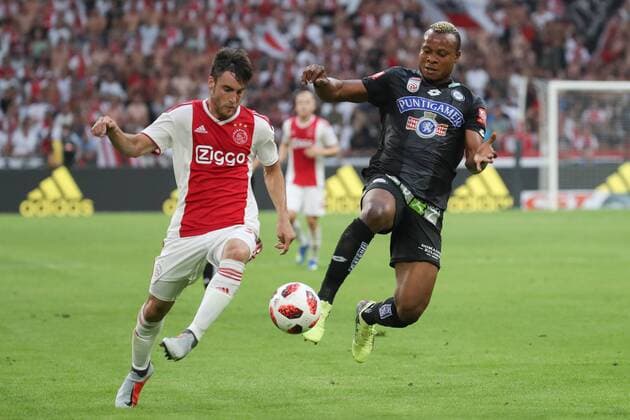 SOCCER - UEFA CL quali, Ajax vs Sturm AMSTERDAM,NETHERLANDS,25.JUL.18 - SOCCER - UEFA Champions League qualification, AFC Ajax Amsterdam vs SK Sturm Graz. Image shows Nico Tagliafico (Ajax) and Emeka Friday Eze (Sturm). GEPAxpictures xChristianxWalgram