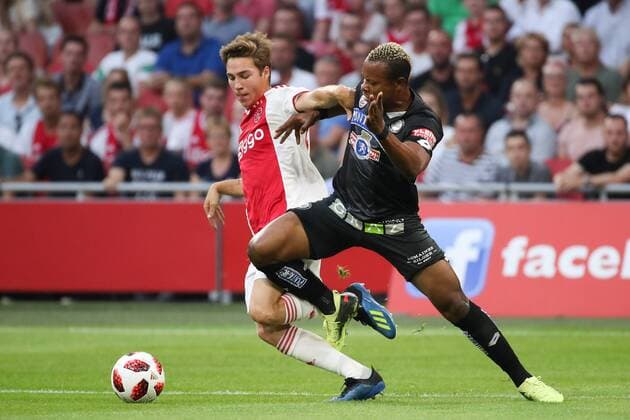 SOCCER - UEFA CL quali, Ajax vs Sturm AMSTERDAM,NETHERLANDS,25.JUL.18 - SOCCER - UEFA Champions League qualification, AFC Ajax Amsterdam vs SK Sturm Graz. Image shows Lasse Schoene (Ajax) and Emeka Friday Eze (Sturm). GEPAxpictures xChristianxWalgram