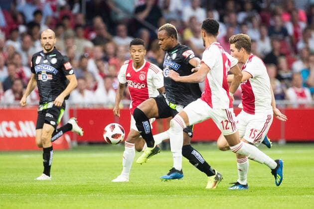 David Neres of Ajax, Emeka Friday Eze of SK Sturm Graz, Noussair Mazraoui of Ajax, Carel Eiting of Ajax during the UEFA Champions League second round qualifying first leg match between Ajax Amsterdam and Sturm Graz at the Johan Cruijff Arena on July 25, 2018 in Amsterdam, The Netherlands UEFA Champions League 2018 2019 xVIxVIxImagesx xTomxBodexMultimediaxIVx 11586547