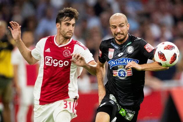 Nico Tagliafico of Ajax, Fabian Kochsk of SK Sturm Graz during the UEFA Champions League second round qualifying first leg match between Ajax Amsterdam and Sturm Graz at the Johan Cruijff Arena on July 25, 2018 in Amsterdam, The Netherlands UEFA Champions League 2018 2019 xVIxVIxImagesx xTomxBodexMultimediaxIVx 11586796