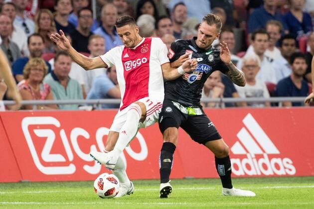 Dusan Tadic of Ajax, Lukas Spendlhofer of SK Sturm Graz during the UEFA Champions League second round qualifying first leg match between Ajax Amsterdam and Sturm Graz at the Johan Cruijff Arena on July 25, 2018 in Amsterdam, The Netherlands UEFA Champions League 2018 2019 xVIxVIxImagesx xTomxBodexMultimediaxIVx 11586898