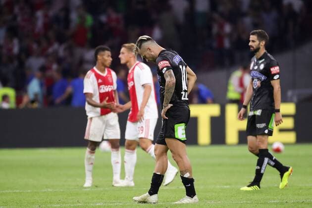 SOCCER - UEFA CL quali, Ajax vs Sturm AMSTERDAM,NETHERLANDS,25.JUL.18 - SOCCER - UEFA Champions League qualification, AFC Ajax Amsterdam vs SK Sturm Graz. Image shows the disappointment of Peter Zulj and Anastasios Avlonitis (Sturm). GEPAxpictures xChristianxWalgram